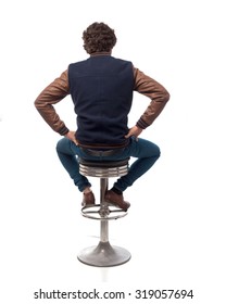 Young Man Back With Bar Stool