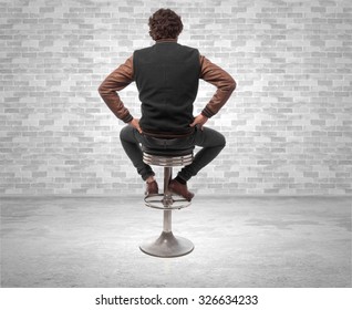 Young Man Back With Bar Stool