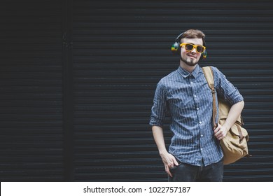 Young Man With Backpack Enjoying Travel 