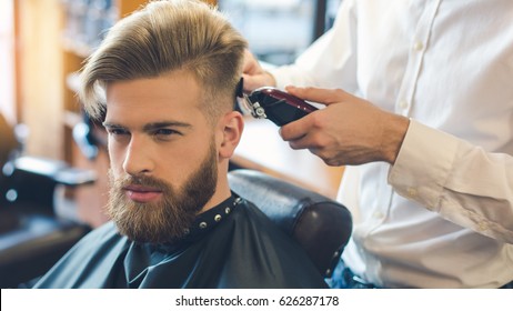 Young Man In Barbershop Hair Care Service Concept