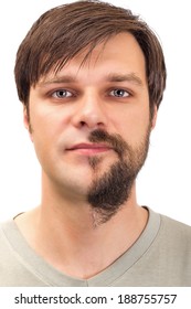 Young Man With  Beard On Half Of The Face On White Background