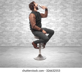 Young Man With Beer Bar Stool