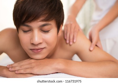 Young Man Being Pampered In Dayspa