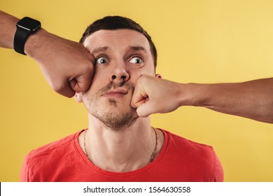 Young Man Being Punched In The Face 