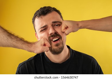 Young Man Being Punched In The Face 