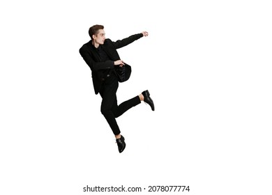 Young Man In Black Business Suit Dancing Isolated On White Background. Art, Motion, Action, Flexibility, Inspiration And Ad Concept. Flexible Caucasian Ballet, Contemporary Dancer Weightless Moves