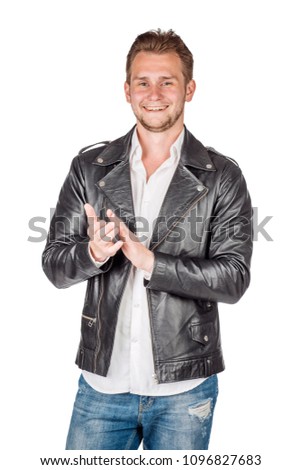 young man in black eather jacket isolated on a white background. Emotion and people concept.