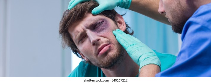 Young Man With Black Eye In Emergency Room