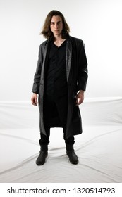 Young Man In Black Trench Coat 