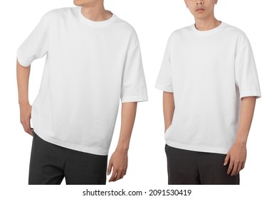 Young man in blank oversize t-shirt mockup front and back used as design template, isolated on white background with clipping path. - Shutterstock ID 2091530419