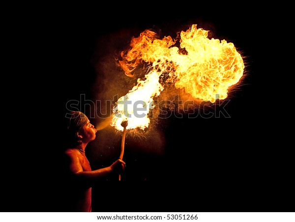 Young Man Blowing Fire His Mouth Stock Photo (Edit Now) 53051266