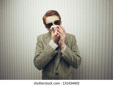 Young Man Blowing Her Nose With Kleenex, Old Style Image