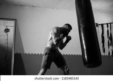 Young Man Boxing Workout In An Old Building