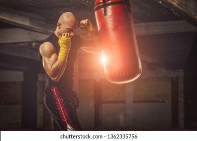 Young Man Boxing Workout In An Old Building