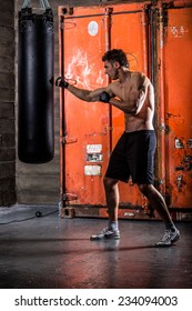 Young Man Boxing Workout In An Old Building