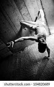 Young man break dancing. Black and white.