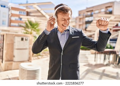 Young Man Business Worker Listening To Music Dancing At Street