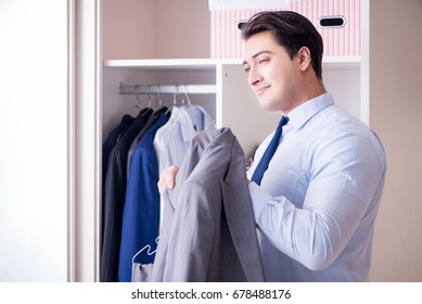 Young Man Businessman Getting Dressed For Work