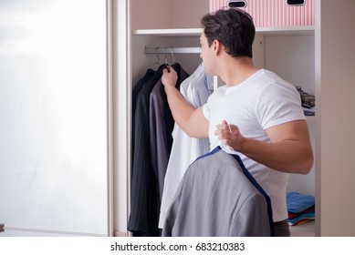 Young Man Businessman Getting Dressed For Work