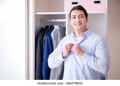 Young Man Businessman Getting Dressed For Work