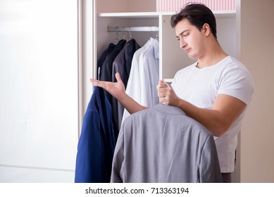 Young Man Businessman Getting Dressed For Work