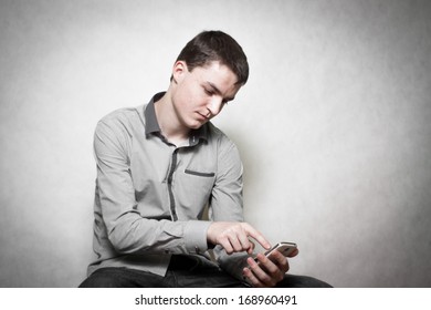 A Young Man Calling A Police