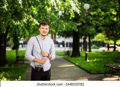 
young man with a camera