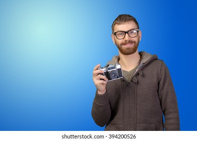 Young man with camera
