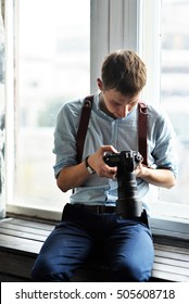 young man with camera 