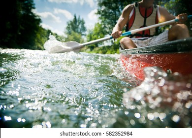 Young Man Canoeing