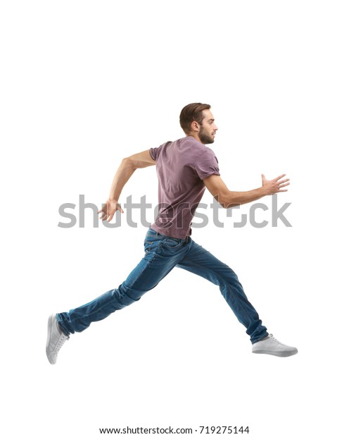 Young Man Casual Clothes Running On Stock Photo (Edit Now) 719275144