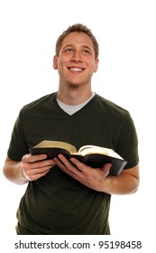 Young Man Casually Dressed Holding Open Bible