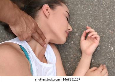 checking an unconscious person clipart