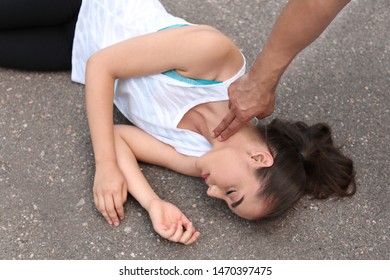 checking an unconscious person clipart