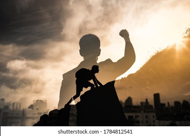 Young man in the city reaching his goals. People inspiration and never giving up concept.  - Shutterstock ID 1784812541