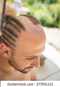 Young Man Closeup Portrait With Strange Haircut