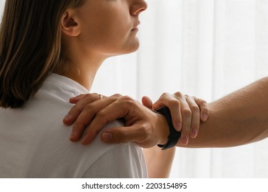 Young Man Comforting And Supporting A Sad Woman Who Is In Serious Trouble At Home, Consolation And Encouragement Concept