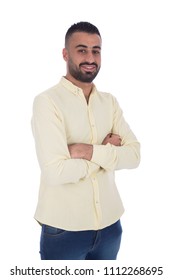 young man cross arms standing and smiling to the camera , isolated in white background