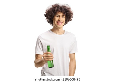 Young Man With Curly Hair Holding A Bottle Of Beer And Looking At Camera Isolated On White Background