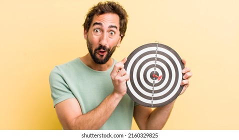 Young Man With A Darts Target