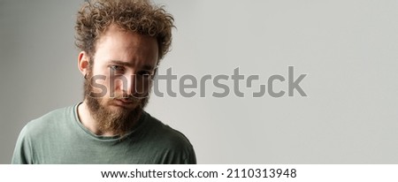 Young Man in Deep Drama Thinks how to Solve his Problems, Depression, Apathy. Depressed Guy. Close-up. Copy Space. 
