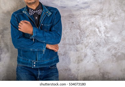 Young Man Denim Blue Jean Jacket. Background Wall. For Design Denim Fashion. Retro Style