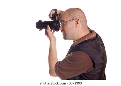 Young man with digital camera taking picture