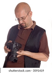 Young man with digital camera taking picture