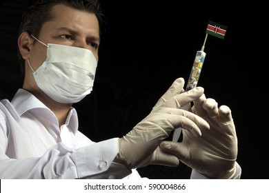 Young Man As A Doctor Gives A Medical Injection To Kenyan Flag On A Black Background