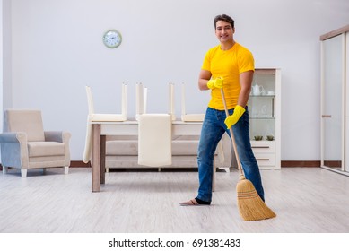 Young Man Doing Chores Home Stock Photo 691381483 | Shutterstock