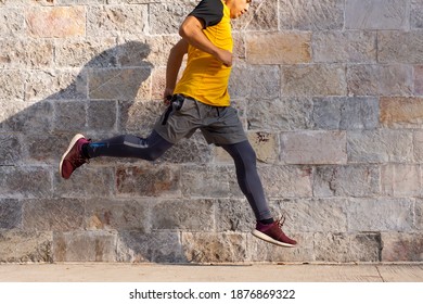 Young man doing exercise on the street