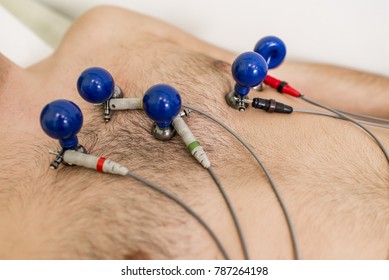 Young man doing preventive ECG in hospital