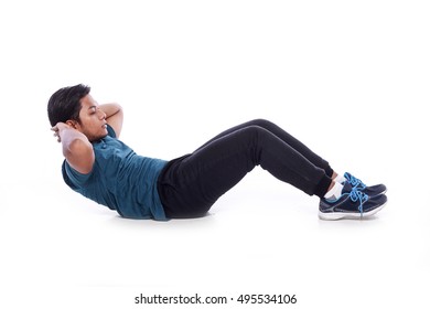 Young Man Doing Sit Up Isolated On White Background