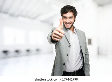 Young Man Doing Thumbs Up Sign